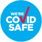 Blue circle with text "We're COVID Safe," featuring a red check mark seamlessly integrated into the word "COVID," serves as a reassuring emblem. Perfect for support coordination services, it symbolizes commitment to health and safety standards.